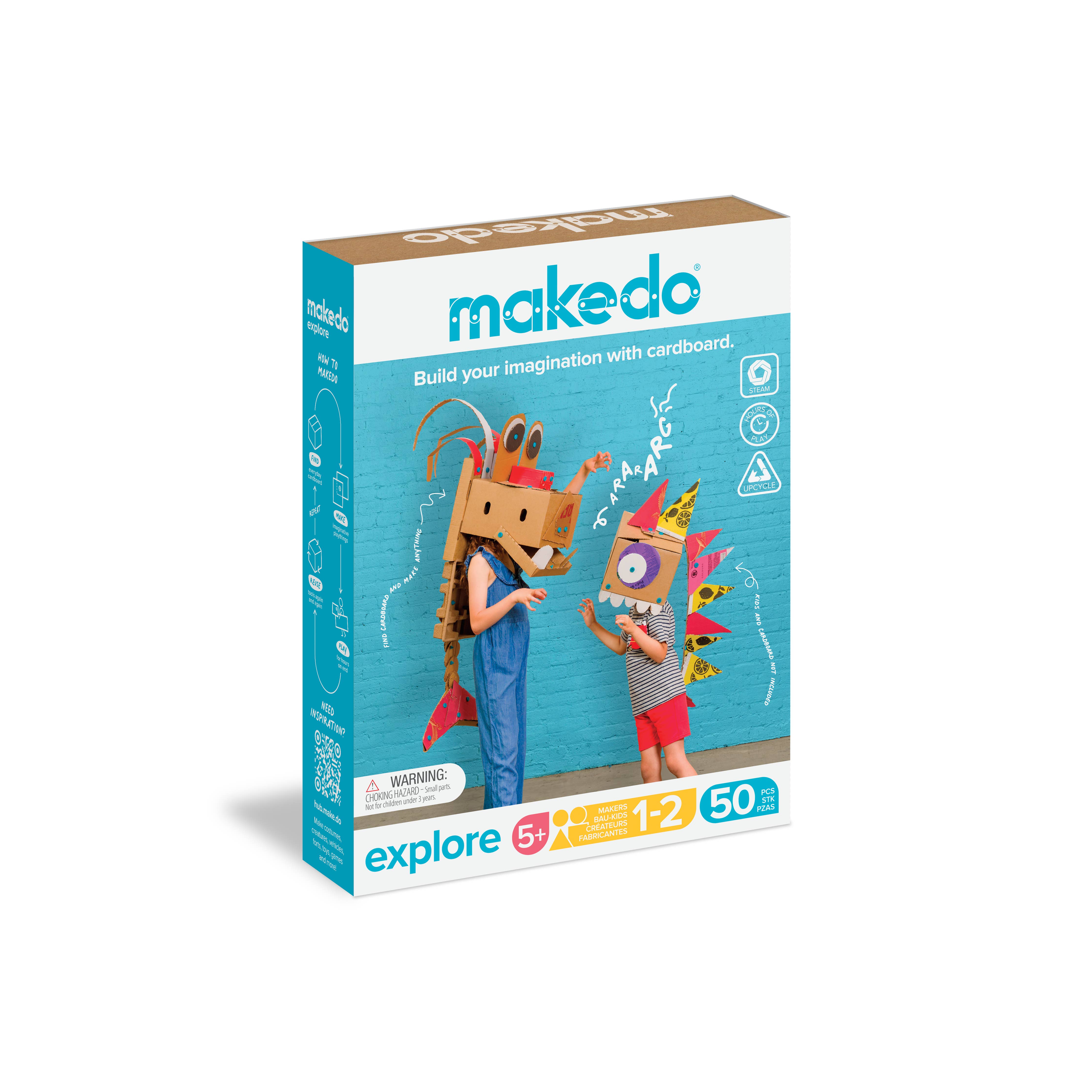 Blue Makedo Explore box showing two children in cardboard dragon costumes. Includes 50 pieces for ages 5+.