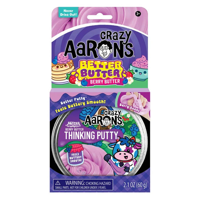Packaging for Crazy Aaron's Better Butter Berry Butter Thinking Putty featuring berry graphics and a purple cow.