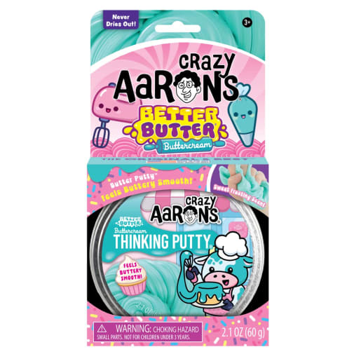 A tin and decorative box of teal-colored Better Butter Buttercream Thinking Putty featuring a cartoon cow chef.