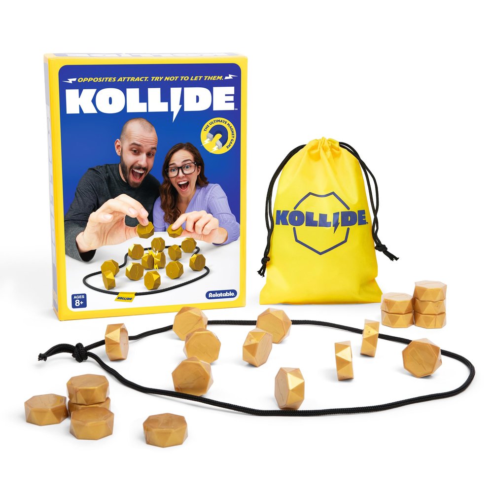 Kollide game box and components including gold geometric magnets, a yellow drawstring bag, and a black rope circle.