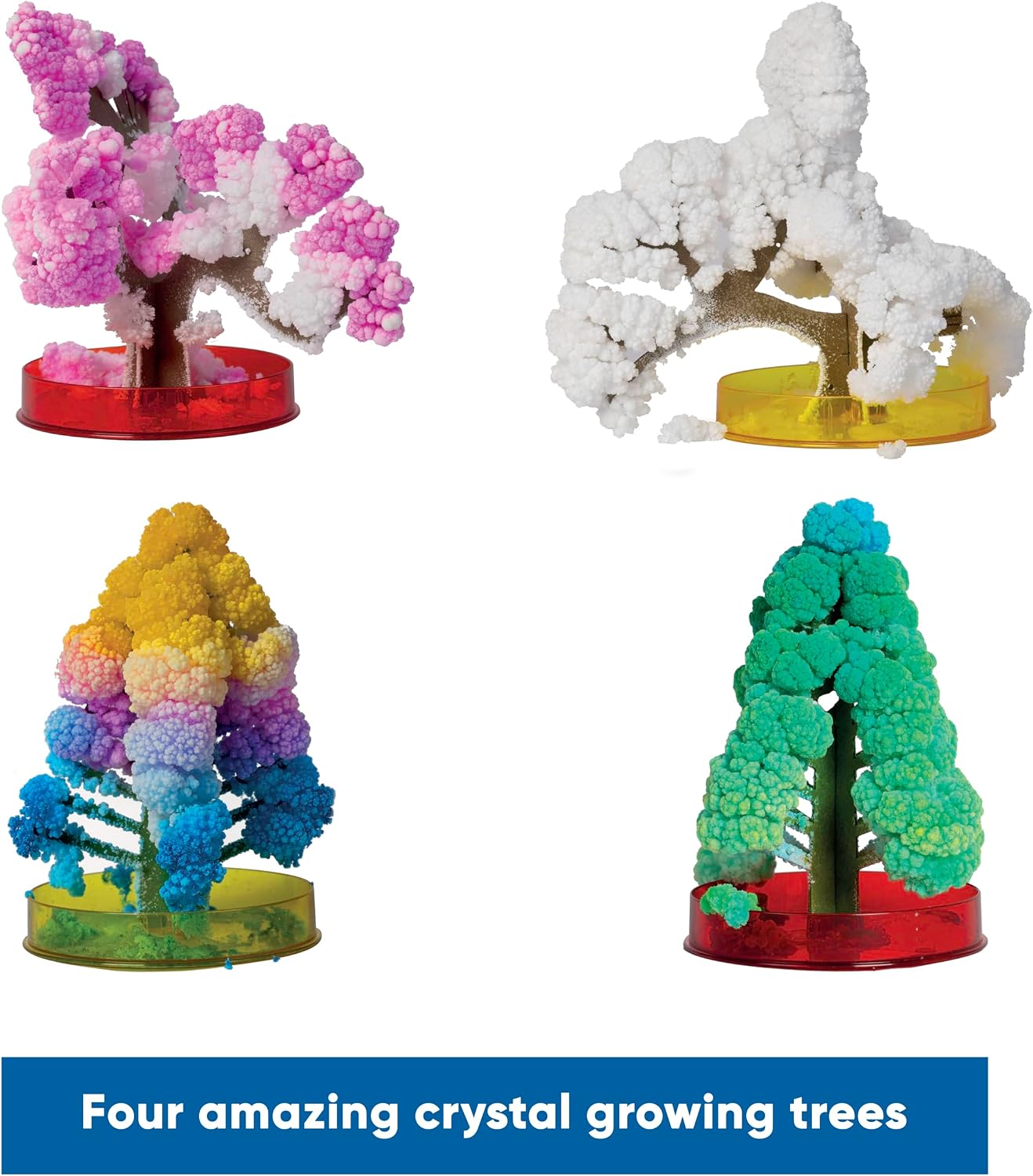 Four crystal trees with fluffy pink, white, rainbow, and green clusters, each sitting in a colorful circular base.