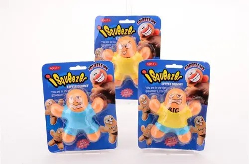 Three packaged iSqueezer Little Dummy toys featuring orange-headed stretchy figures in blue and yellow outfits.