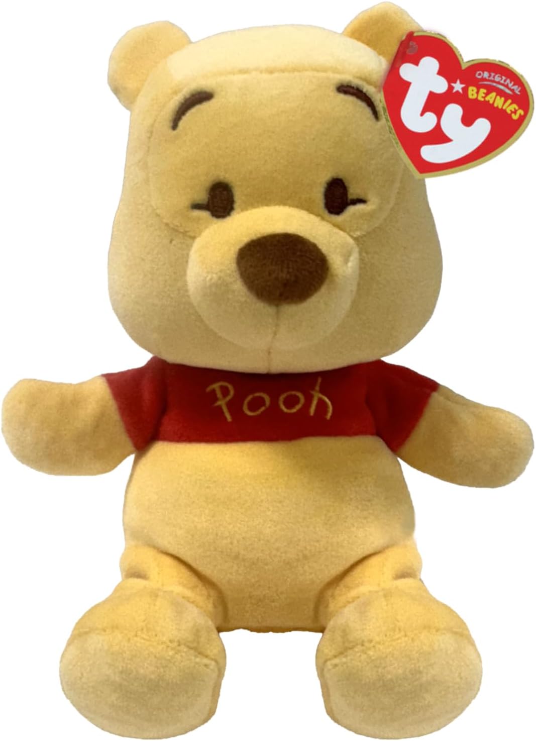 Yellow Winnie the Pooh plush toy wearing a red shirt with gold 'Pooh' text and a red Ty heart tag on its ear.