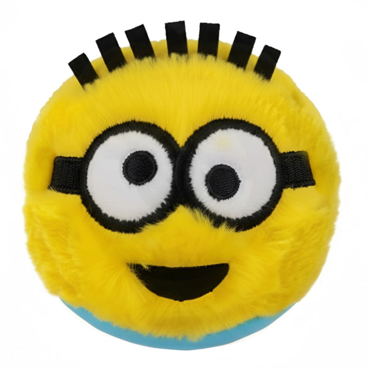 Round yellow Minion plush toy with shaggy fur, large embroidered goggle eyes, and black fabric hair spikes.