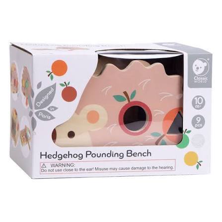 Boxed wooden hedgehog pounding bench with shape sorting holes and fruit illustrations for ages 10 months and up.