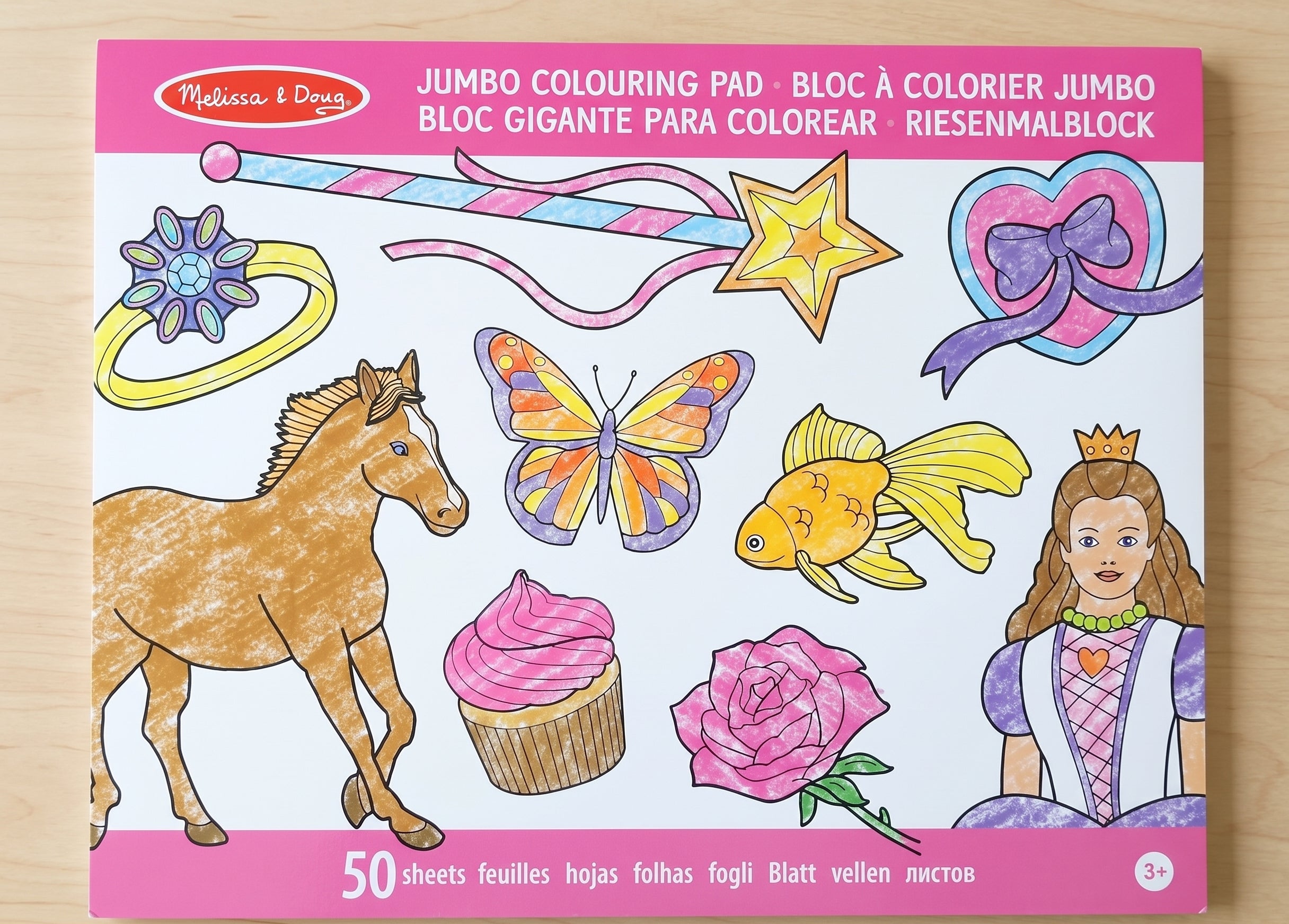 Cover of a Melissa & Doug Jumbo Colouring Pad featuring drawings of a horse, butterfly, princess, and cupcake.