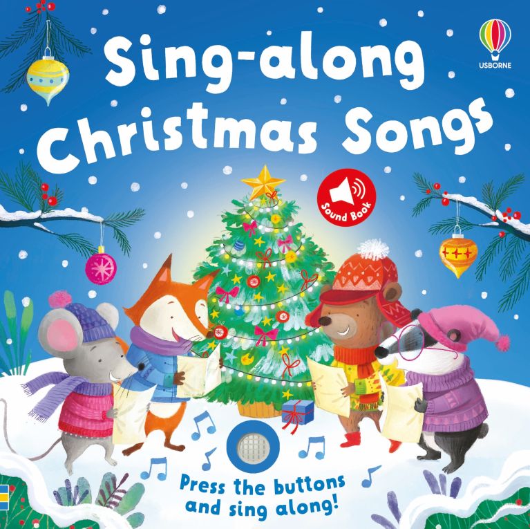 Christmas sound book cover with a fox, bear, mouse, and badger singing carols by a decorated tree in the snow.