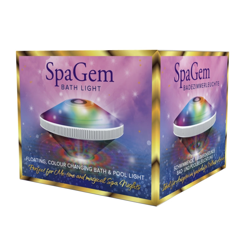 A gem-shaped floating LED light in its purple and gold packaging, showing rainbow-coloured light projections.