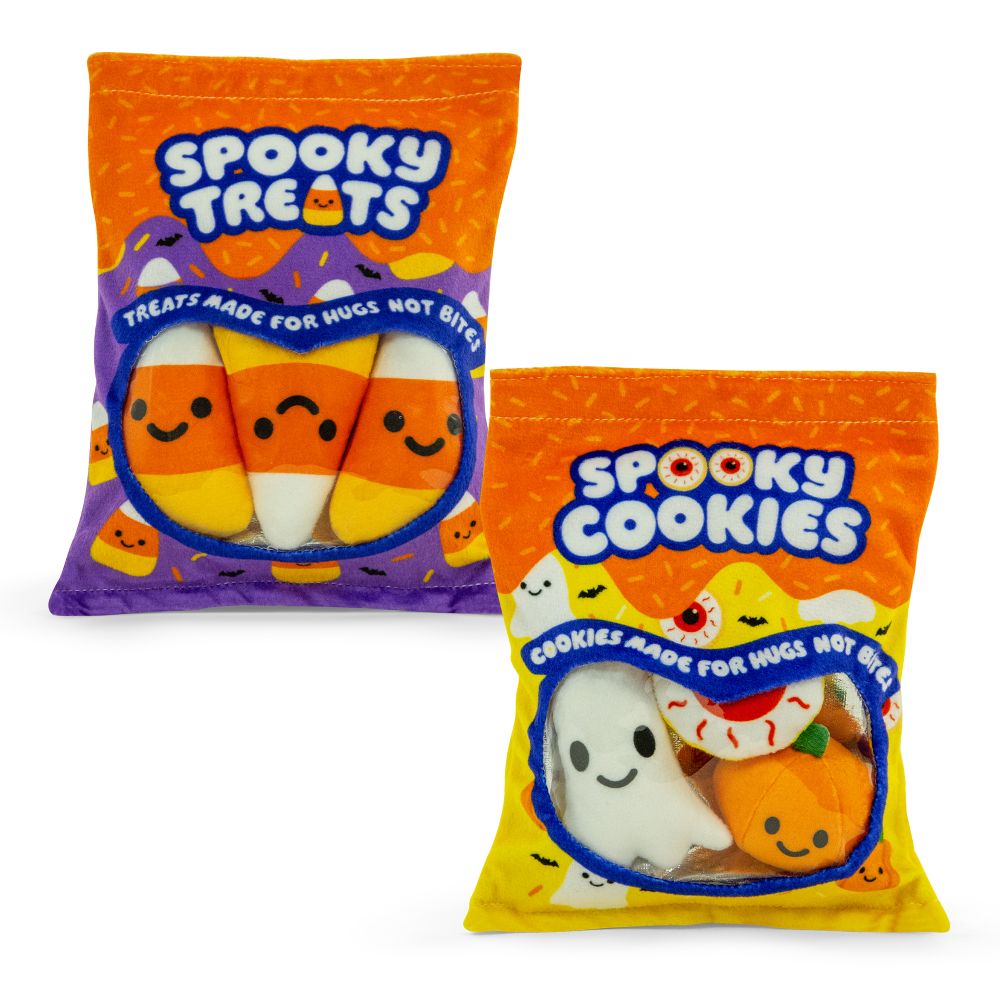 Two orange plush snack bags containing small Halloween-themed soft toys like candy corn, a ghost, and a pumpkin.