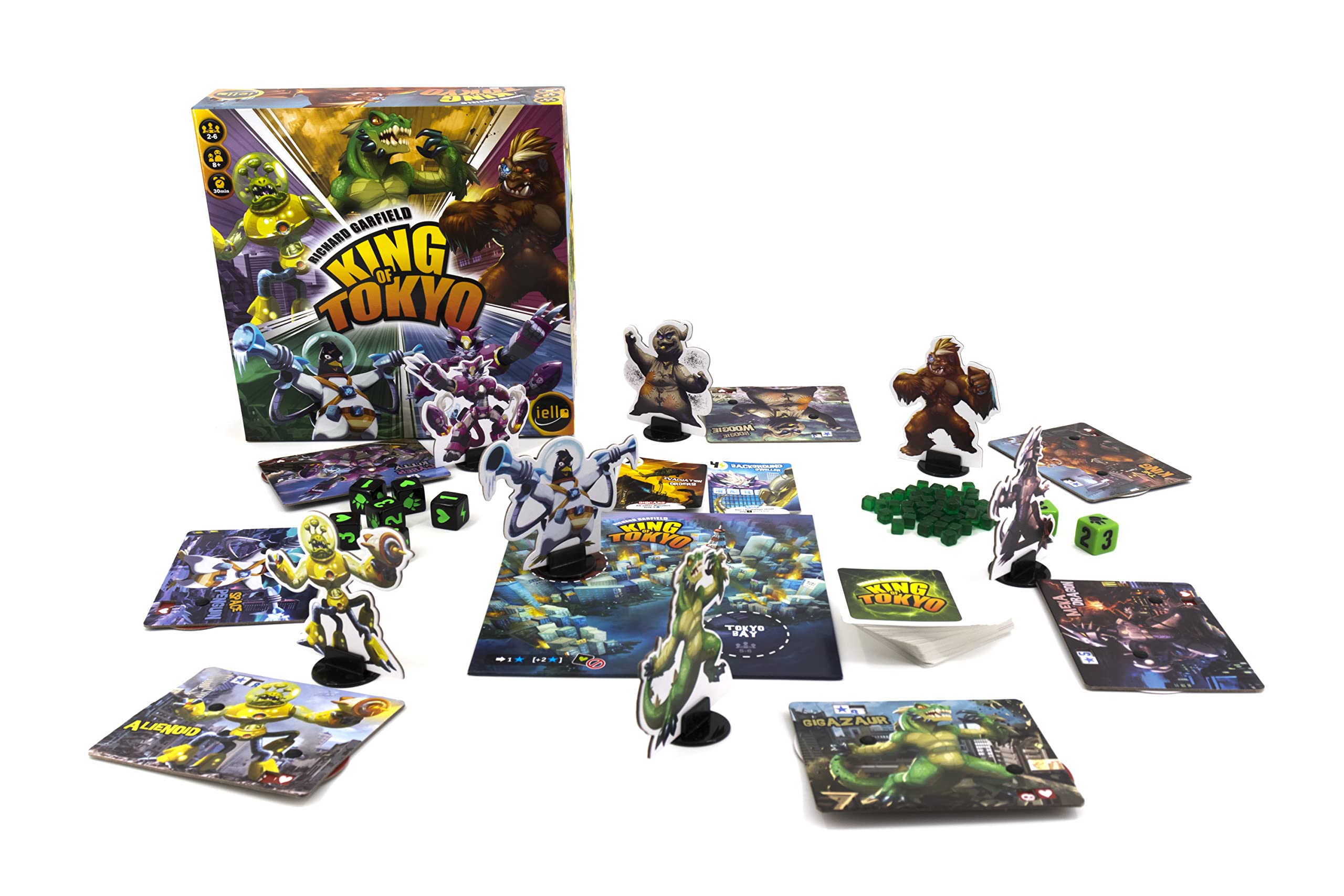 Board game 'King of Tokyo' with game pieces and cards on a white background