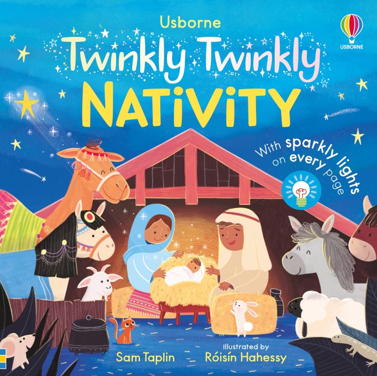 Blue book cover featuring a nativity scene with Mary, Joseph, baby Jesus, and animals under a star-filled sky.