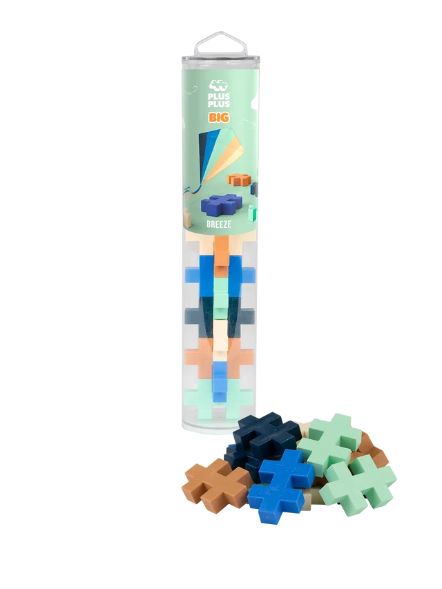 Plus-shaped building blocks in blue, mint, and orange, shown inside a clear tube and scattered at the base.
