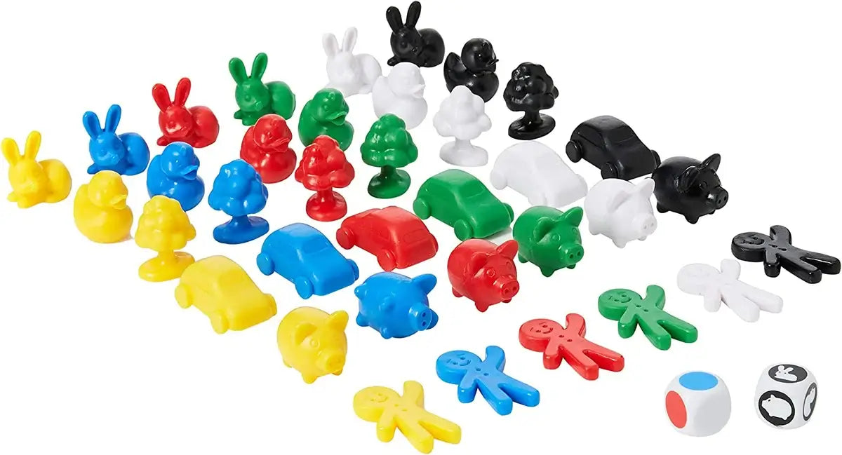 Colorful plastic rabbits, ducks, trees, cars, pigs, and people in six colors arranged in rows with two game dice.