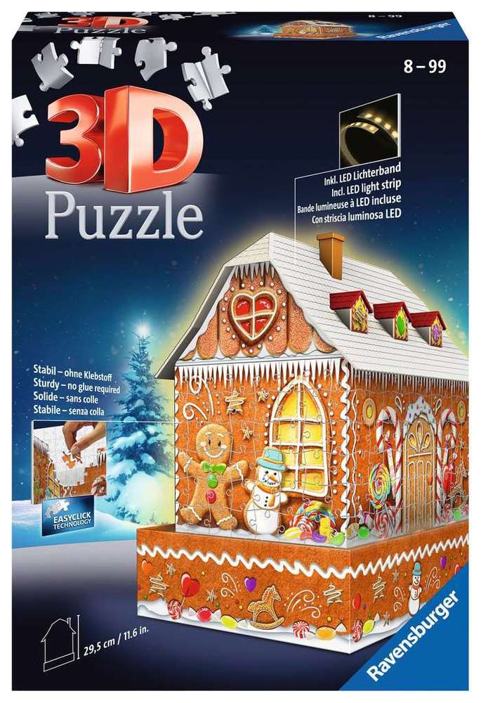 A 3D gingerbread house puzzle box showing an illuminated model with a gingerbread man and snow-dusted roof.