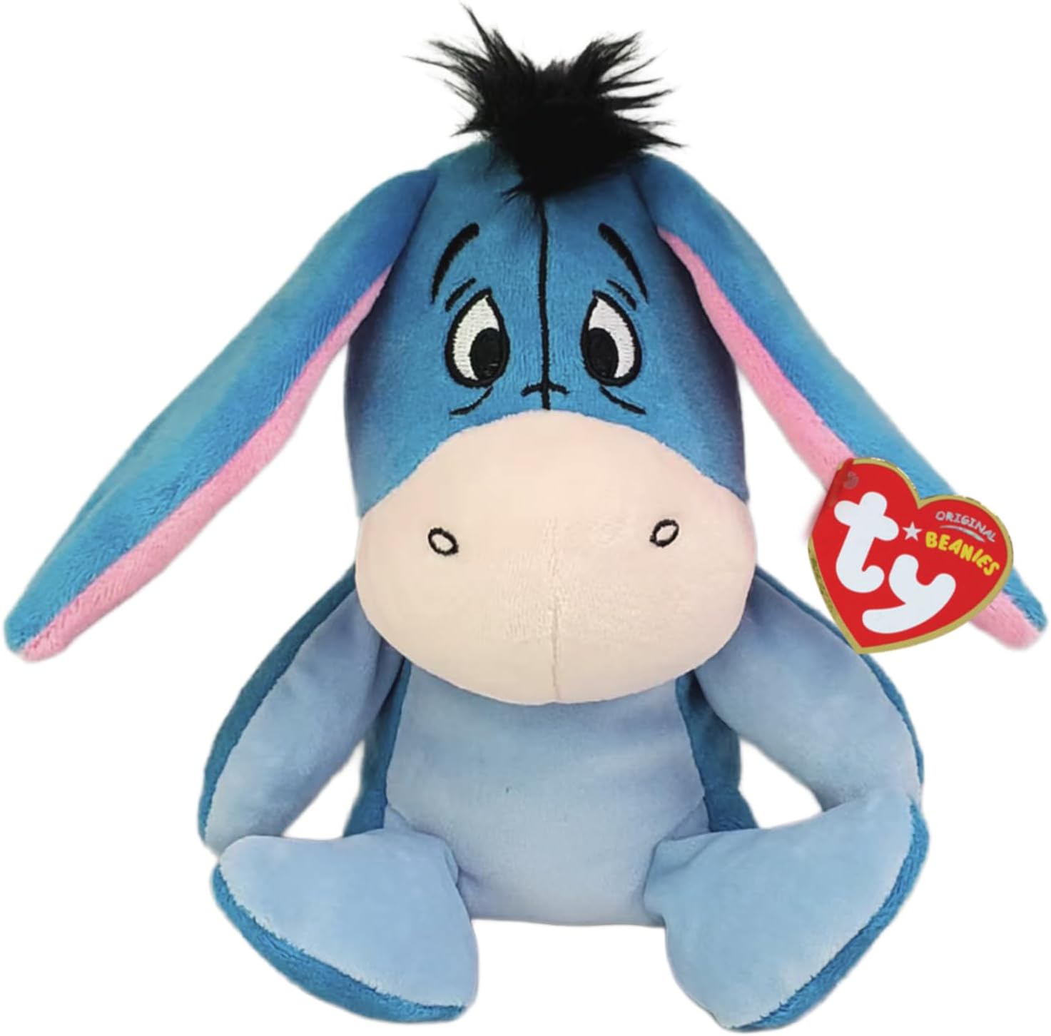 Blue Eeyore plush donkey with pink inner ears, black hair tuft, and a red heart-shaped Ty Beanie tag.