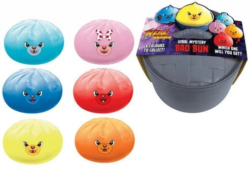 Six colorful squeezable bear toys in bao bun shapes next to a grey plastic steamer basket mystery container.