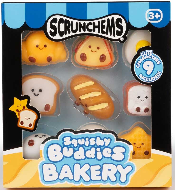 Nine small, smiley-faced bakery squishies in a windowed box, including a croissant, baguette, and waffle.