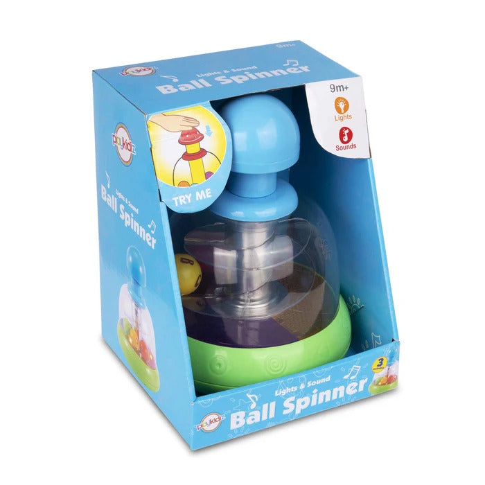 Blue and green push-down ball spinner toy with light-up features and colorful internal balls in blue packaging.