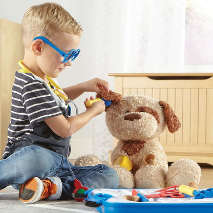 Baby playing best sale doctor set