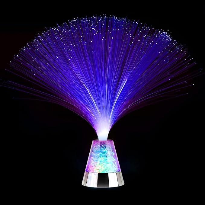 Fiber optic lamp with blue glowing strands and a multicolored crystal-filled base against a black background.