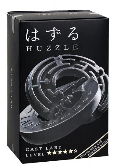 Black packaging for Huzzle Cast Laby showing two interlocking, circular metal pieces with intricate maze-like grooves.