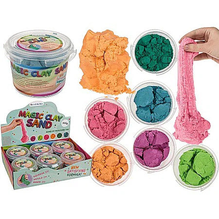 Colorful Magic Clay Sand in tubs and piles with a hand stretching a pink strand of the sand against a white background.