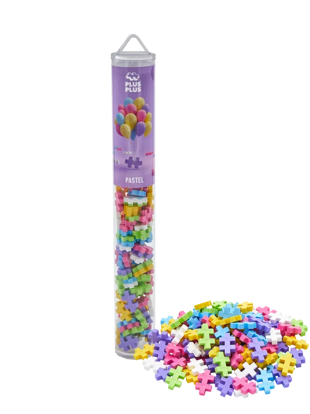 Clear tube and pile of pastel pink, blue, yellow, green, purple, and white plus-shaped building blocks.