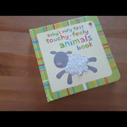 Baby's very first touchy-feely animals book