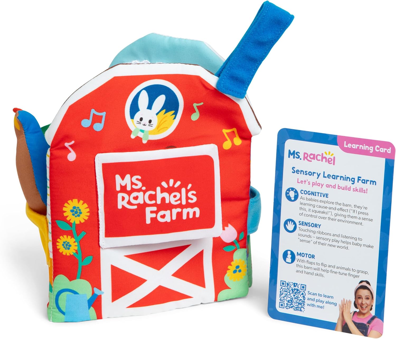 A red plush toy barn with a bunny in the window, colorful flowers, and an accompanying sensory learning guide card.