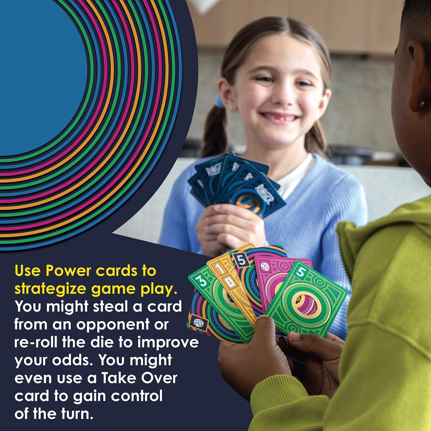 Two children playing a card game with colorful, numbered power cards featuring bright concentric circle designs.