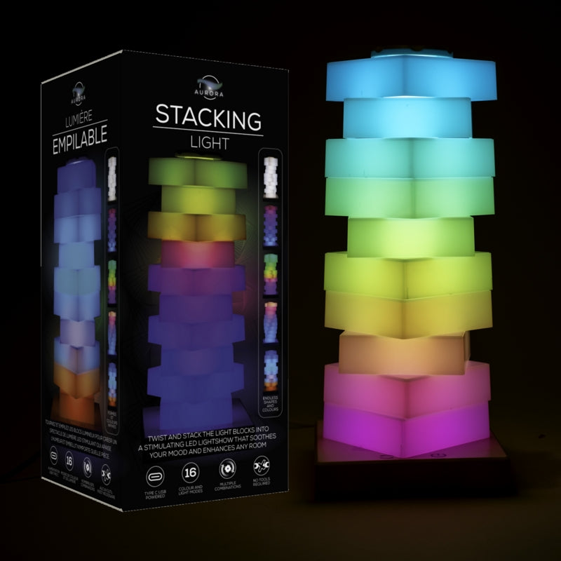 Multi-colored glowing tower of stacked blocks beside a black box labeled Stacking Light.
