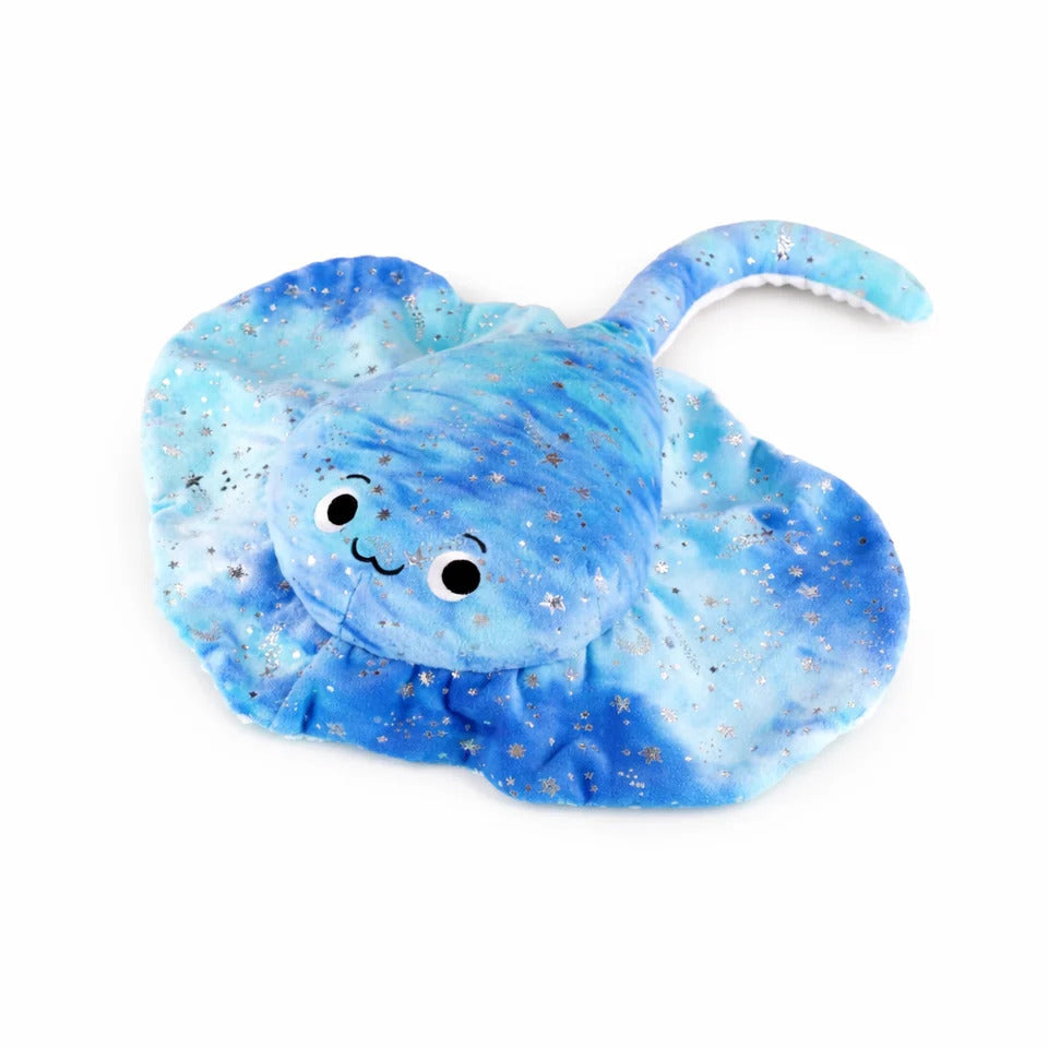 Blue stingray plush with silver stars and moons, a cute face, and a long tail on a white background.