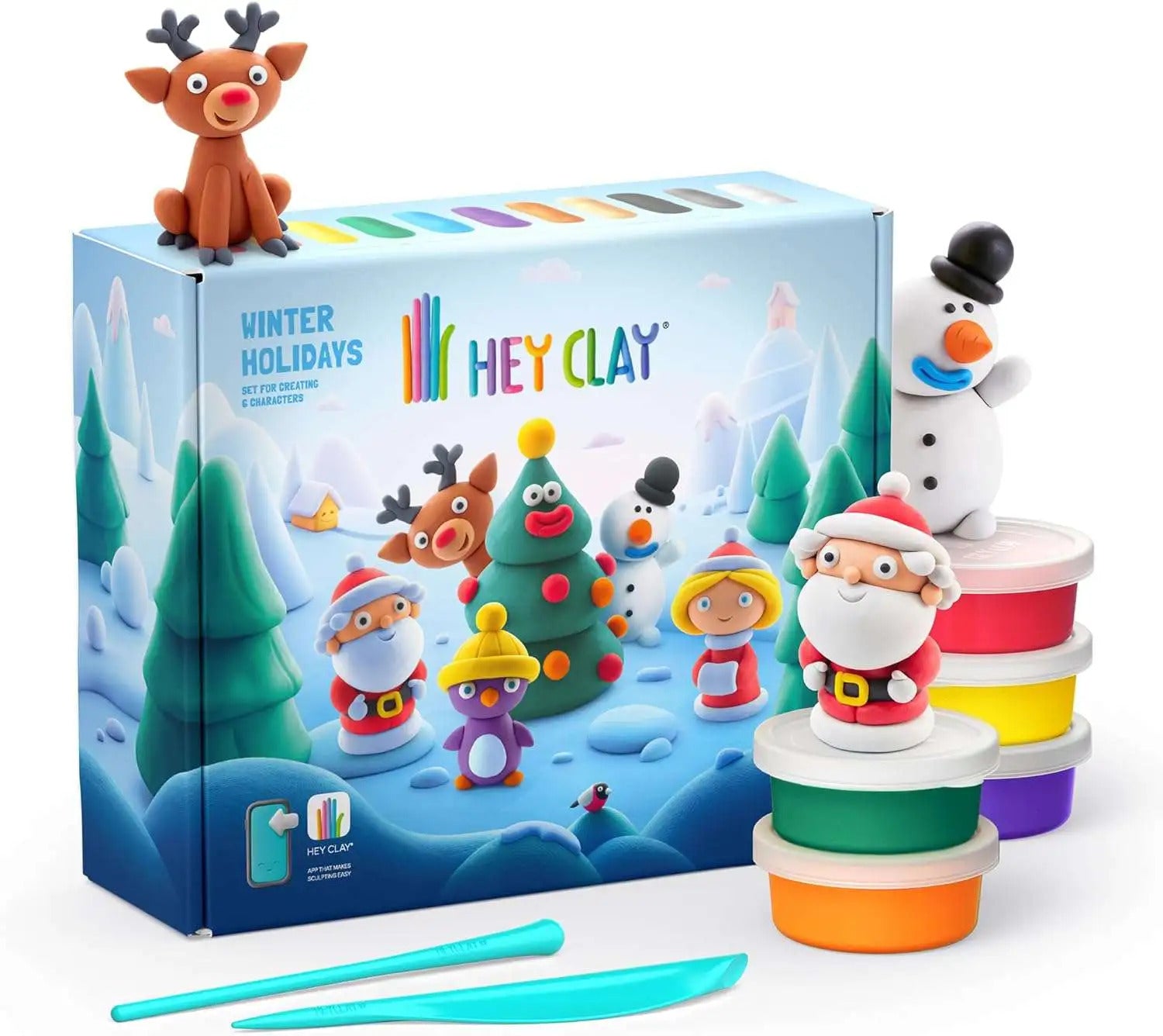 Hey Clay Winter Holidays kit with holiday clay figures, colorful tubs, and two sculpting tools on a white background.